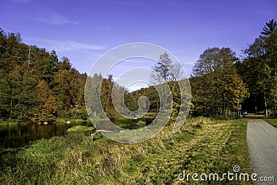Autumn landscape at the rain river in Bavaria Stock Photo