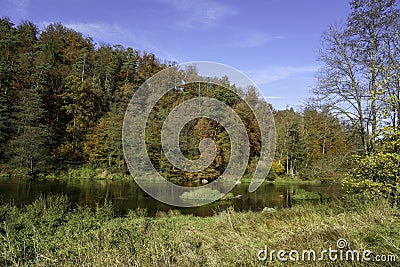 Autumn landscape at the rain river in Bavaria Stock Photo