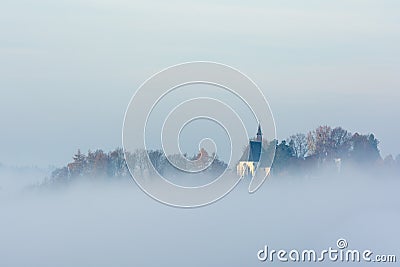 Austrian church in the fog Stock Photo