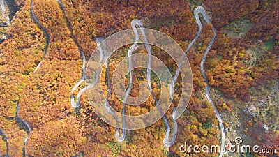 Autumn mountain zigzag road view from above Stock Photo