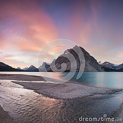 Autumn in the mountains near Bow Lake Banff National Park Alberta Canada Bow Lake panorama reflection with first snow in mountains Stock Photo