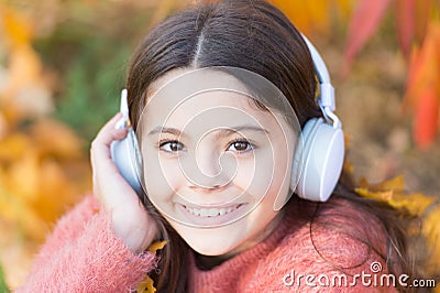 Autumn playlist concept. Music for autumn cozy mood. Listening song. Enjoy music outdoors fall warm day. Audio file Stock Photo