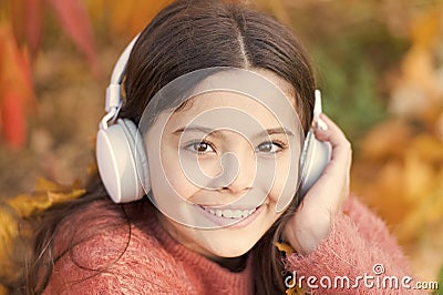 Autumn playlist concept. Music for autumn cozy mood. Listening song. Enjoy music outdoors fall warm day. Audio file Stock Photo
