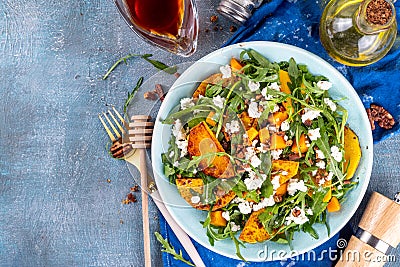 Autumn pumpkin and arugula salad Stock Photo