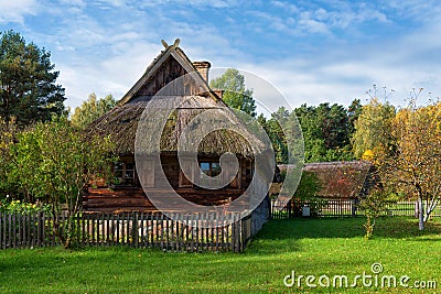 Rural farmstead ancient wooden house Rumsiskes Lithuania Stock Photo