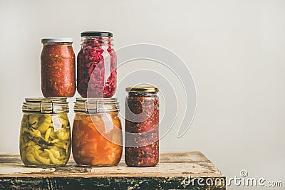 Autumn seasonal pickled or fermented vegetables in jars, copy space Stock Photo