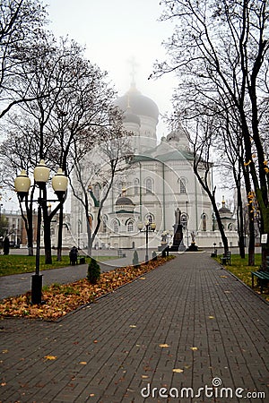 Autumn. Square on the background of the Church Stock Photo