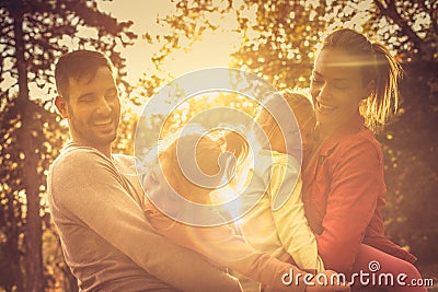 Autumn sunset. Funny family. Stock Photo