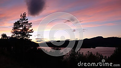 Autumn sunset in Tingvoll fjord in Norway Stock Photo