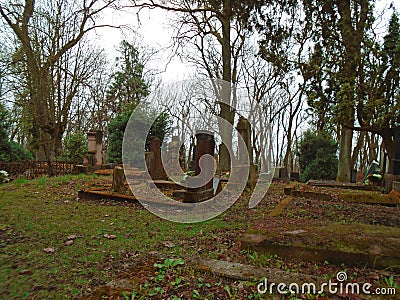 Autumn time in the old abandoned and ransacked Jewish cemetery Stock Photo