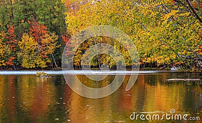 Autumn tree reflections at Lac Chat in Mont Tremblant national park Stock Photo