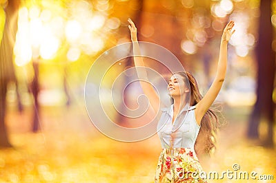 Autumn Woman, Happy Young Girl, Floating Model Open Arms in Yell Stock Photo