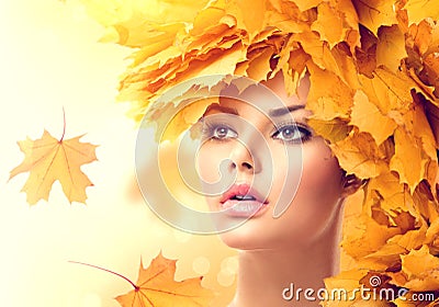 Autumn woman with yellow leaves hairstyle Stock Photo