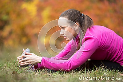 Autumn yoga: Seated Forward Bend yoga pose Stock Photo