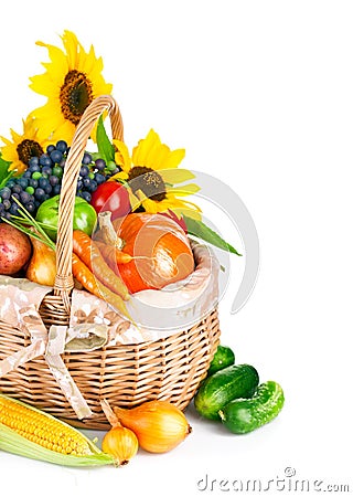 Autumnal harvest vegetables and fruits in basket Stock Photo