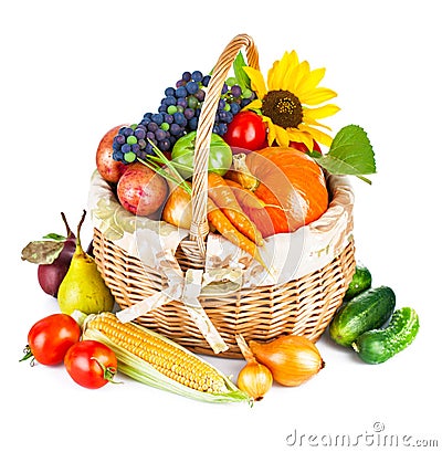 Autumnal harvest vegetables and fruits in basket Stock Photo