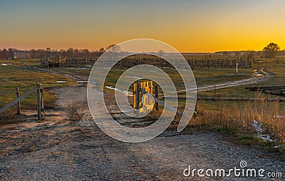 Landscape with road to outdoor cattle stall in central Ukraine Stock Photo