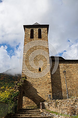 Autumnal view of the tower of the Romanesque church of Torla, in Huesca Stock Photo