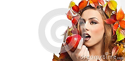 Autumnal woman. Beautiful creative makeup and hair style in fall concept studio shot. Beauty fashion model girl with fall makeup Stock Photo