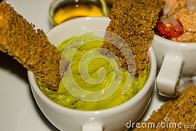 Avacardo Dip with brown toasted bread and a Tuna salad Stock Photo