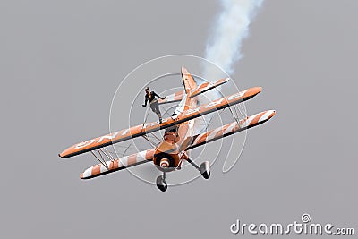 Vintage Boeing Stearman biplane of the Breitling Wing Walkers. Editorial Stock Photo