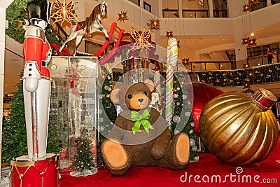 Aventura Mall Christmas decoration: Huge Brown bear and toys Editorial Stock Photo