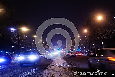 Avenue des Champs-Elysees at snowy night, Paris Stock Photo