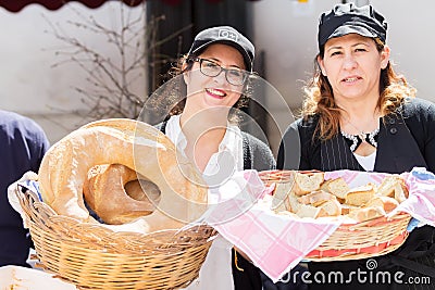 AVETRANA, ITALY - MARCH, 19, 2018. Italian Easter tradition from Salento: Tria di St. Giuseppe, the distribution of food to people Editorial Stock Photo