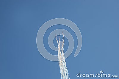 Aviation group `Russian knights` show aerobatics on SU-27 at the air show Editorial Stock Photo