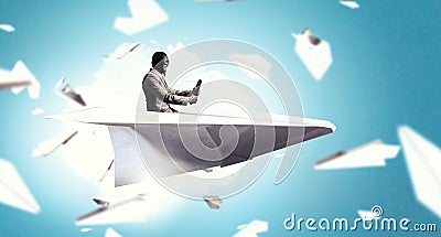 Aviator in origami plane. Mixed media Stock Photo