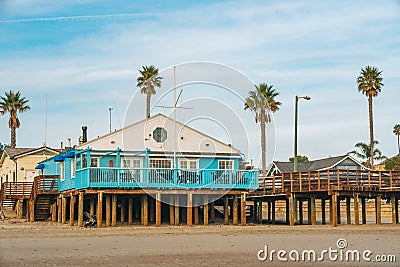 Wide sandy beach, and a wooden rustic pier, Avila beach pier, California Central Coast Editorial Stock Photo