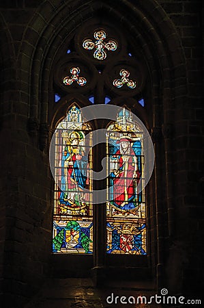 Stained glass window in the gothic Cathedral of Avila Editorial Stock Photo