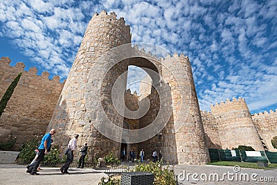 Avila, Spain - October 27: Tourist visiting famous walls on October 27, 2016 in the medieval city of Avila, Spain. Editorial Stock Photo