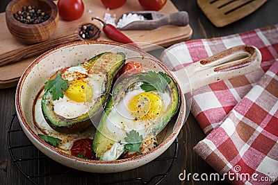 Avocado baked with egg Stock Photo