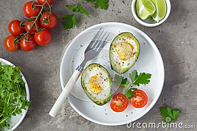 Avocado baked with eggs Stock Photo