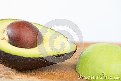 Avocado fruit on wood Stock Photo
