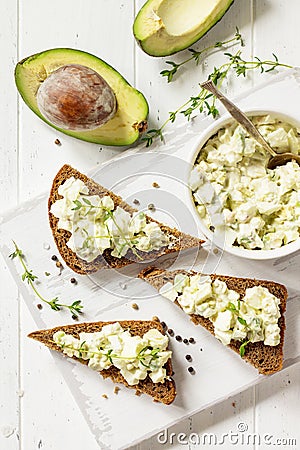 Avocado sandwiches. Traditional latinamerican mexican sauce guacamole. Stock Photo