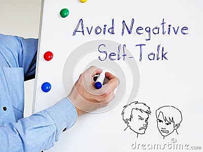 Avoid Negative Self-Talk phrase on the piece of paper Stock Photo