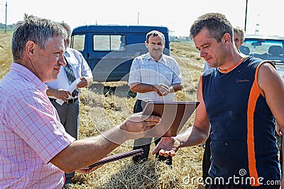 Awarding the best agricultural workers in the Gomel region of Belarus. Editorial Stock Photo