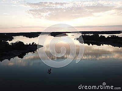 like a mirror is the sunset in archipelago by drones poin of view the gulf of Finland Stock Photo