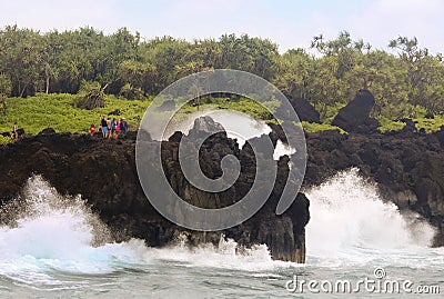 Awesome Crashing Surf at the Blowhole at Waianapanapa State Park Stock Photo