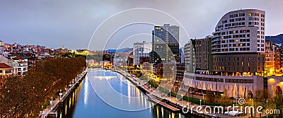 Awesome evening autumn panoramic cityscape view of embankment Estuary of Bilbao. Bilbao, Biscay, Basque country - warm winter in Editorial Stock Photo