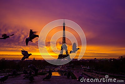 Awesome incredible pink-orange-lilac sunrise. View of the Eiffel Editorial Stock Photo