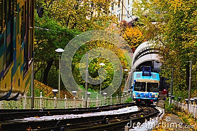 Awesome landscape photo of Funicular on autumn day. It connects historic Uppertown and lower neighborhood of Podil Editorial Stock Photo