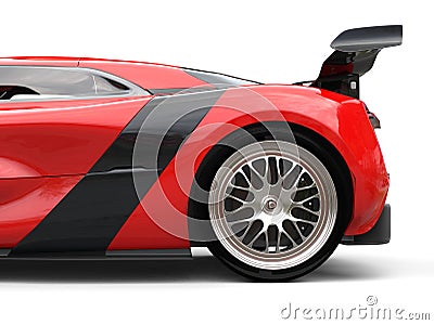 Awesome sports car - rear wheel and rear wing - cut shot Stock Photo