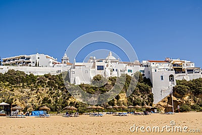 Awesome view of Albufeira whitewashed houses on cliff, Praia dos Pescadores, Albufeira, Portugal Stock Photo