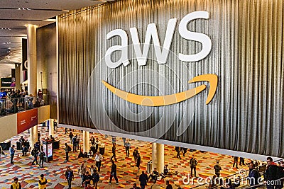 AWS sign is displayed inside convention center hall during AWS re:Invent conference Editorial Stock Photo