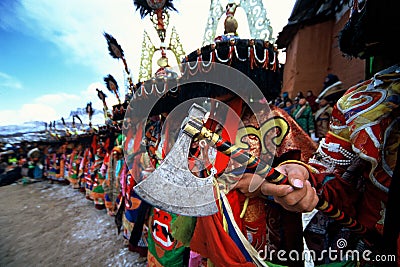 AX in hand at Tibetan religious ritual Stock Photo