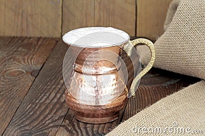 Ayran - Traditional Turkish yoghurt drink in a copper metal cup Stock Photo