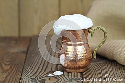 Ayran - Traditional Turkish yoghurt drink in a copper metal cup Stock Photo